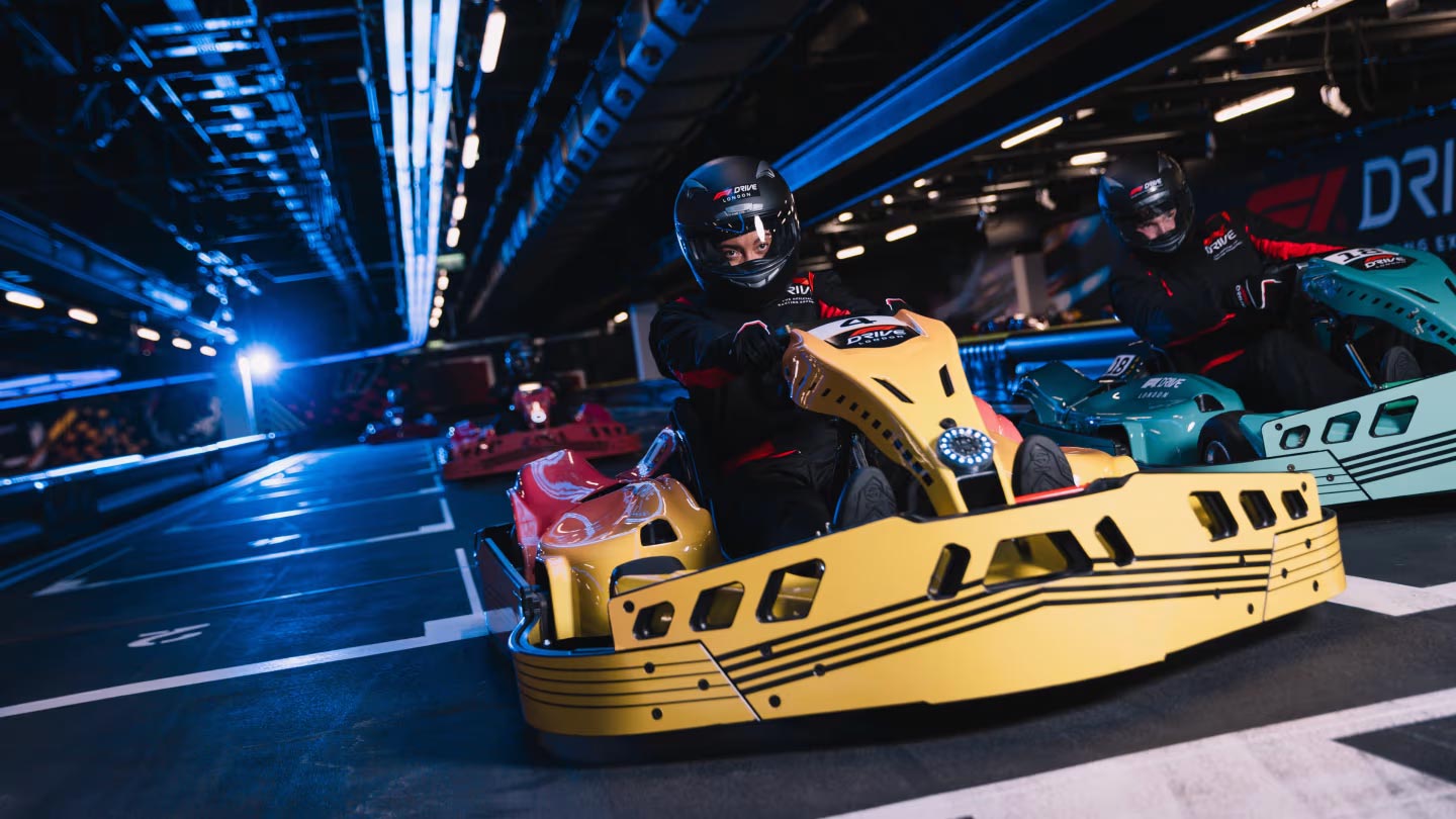 Electric karts on track at F1 Drive London, beneath Tottenham Hotspur Stadium